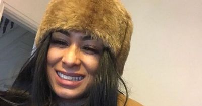 Woman 'sat down in the middle of the road' before car crashed into her