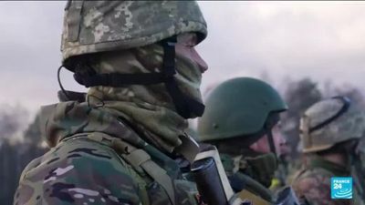 ‘All they can expect here is death’: Ukrainian volunteers brace for Russian attack from Belarus