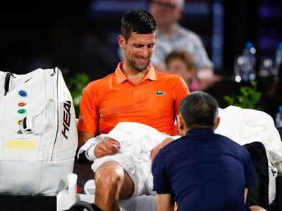 'Unstoppable' Djokovic guarded on injury