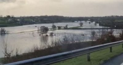 Fields flooded, rivers raging and landslide as torrential rain hits Wales