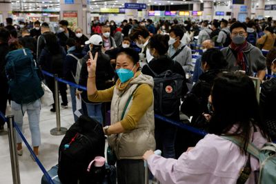 As China lifts pandemic border controls, mixed feelings at home and abroad