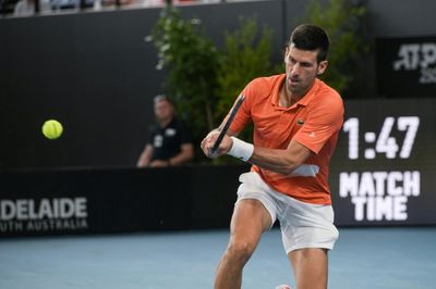 Djokovic survives marathon before winning Adelaide title