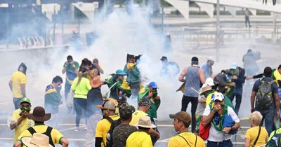 Brazil's president deploys National Guard as pro-Bolsonaro rioters storm Congress and palace