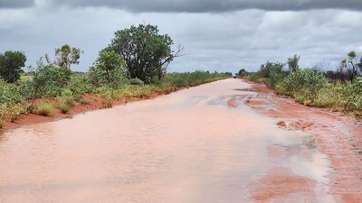 Former tropical cyclone Ellie returns to the NT, bringing heavy rainfall to the territory's south-west