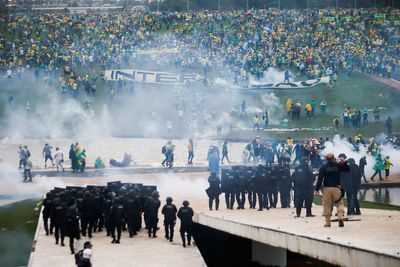 Biden condemns 'assault on democracy' in Brazil