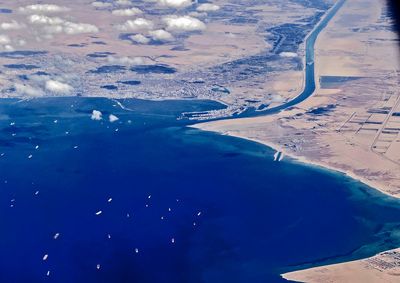 Cargo ship runs aground in single-lane stretch of Suez Canal