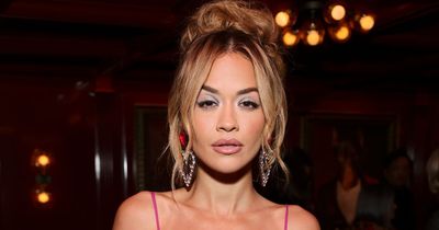 Masked Singer's Rita Ora goes braless in see-through dress at Golden Globes party