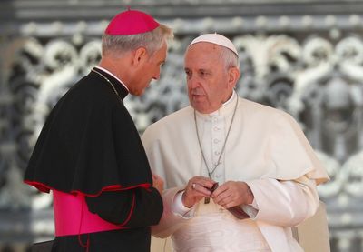 Pope Francis meets Benedict's top aide as memoir rattles Vatican