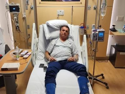 Bolsonaro posts photo from Florida hospital bed – a day after supporters stormed Brazil’s Congress