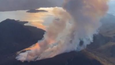 Bushfire near Lake Pedder in 'mop-up stage' as fire authorities brace for coming heatwave