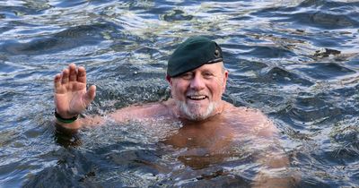 Royal Marine braves city's freezing waters in charity challenge