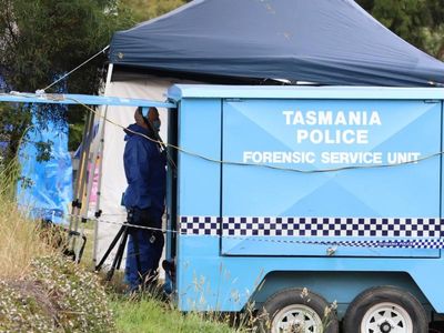 Two more men in court over escapee killing