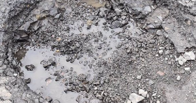 Scots mum injured after falling head first in front of bus after bike hit pothole