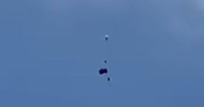 Heartstopping moment skydivers plunge to the ground after their parachute fails to open