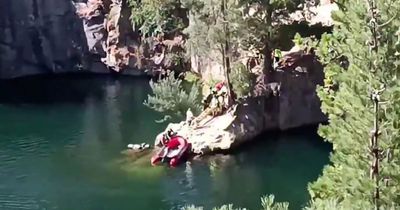 Two seriously injured after jumping off 100ft cliff and bellyflopping into water