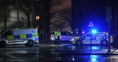 Man stabbed 'for his shopping' outside Aldi as manhunt launched by police