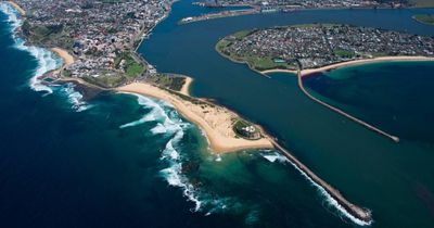 Greens propose coal industry levy as March NSW election policy for Stockton beach