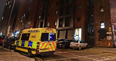 Yelling armed police tell suspect not to 'be scared' as they raid flat