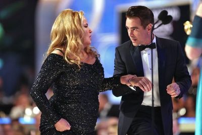 Golden Globes: Colin Farrell escorts Jennifer Coolidge to stage before ‘flirting’ with Ana De Armas