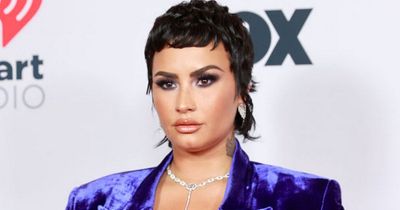 Demi Lovato album poster banned for being 'likely to cause serious offence to Christians'