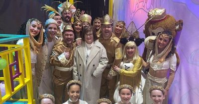 Susan Boyle poses for pics with cast members of popular panto