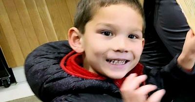 Child, 5, swept away by raging stormwater still missing as search only finds his shoe
