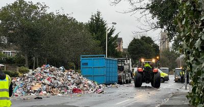Nine tonnes of waste dumped on busy road after smoke spotted from bin lorry