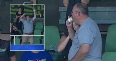 Cricket fan pulls off incredible one-handed catch in stands before taking plaudits