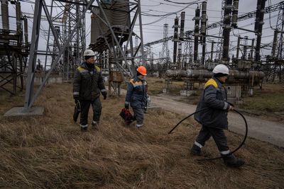 In Ukraine, power plant workers fight to save their 'child'