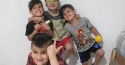 Four young brothers crushed to death by five tonnes of rubble as roof collapsed