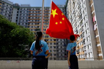 Britain criticises 'erosion of freedoms' in Hong Kong, draws rebuke from China
