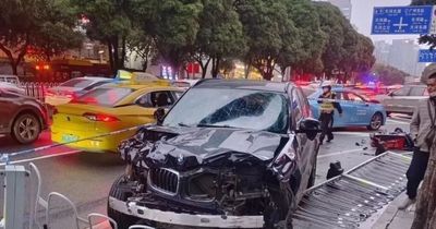 Guangzhou crash: 5 dead after car ploughs into crowd before driver throws money in air