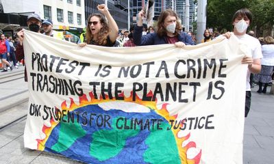 Australia’s credibility on human rights blighted by laws targeting climate protesters and jailing children, report says