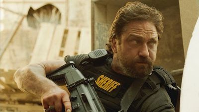 'Den of Thieves 2' is "a lot more fun" than the first film, Gerard Butler says