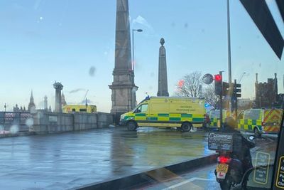 Woman taken to hospital following Lambeth Bridge police incident as roads reopen