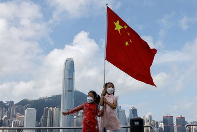 China's foreign ministry branch in Hong Kong urges British gov't to stop Hong Kong report