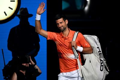 Djokovic 'a bit emotional' after warm return to Australian Open