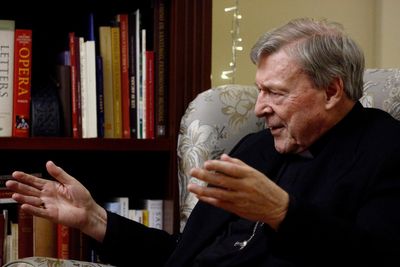 Cardinal Pell lies in state, funeral plans overshadowed by memo revelation