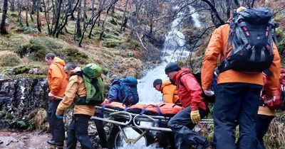 Rescue team stretcher woman across waterfall after horror fall at Glen Nevis