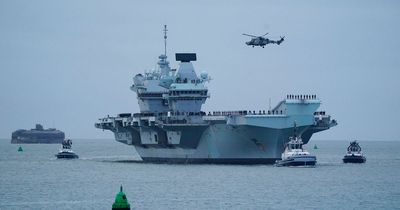 Dramatic moment Russian fighter jets roar past HMS Queen Elizabeth in 'threatening' move