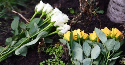 Flowers left for 'lovely woman' killed after being hit by two cars