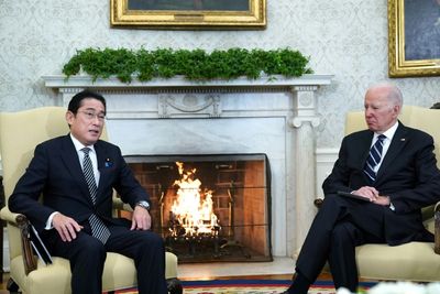 Biden, Kishida tout more muscular Japanese military role