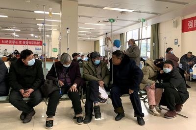 China reports almost 60,000 Covid-related deaths in a month