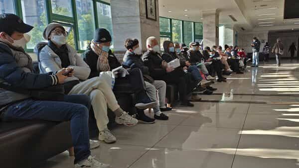 China logs nearly 60,000 Covid deaths over the last 30 days, amid criticism from WHO