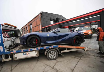 Romanian authorities seize more luxury cars from Andrew Tate’s compound