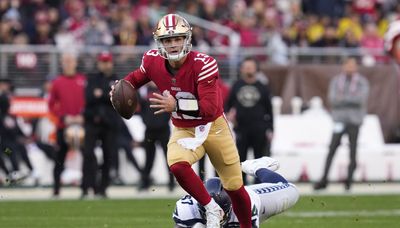 Brock Purdy’s 4 TDs lead 49ers past Seahawks in NFL postseason opener