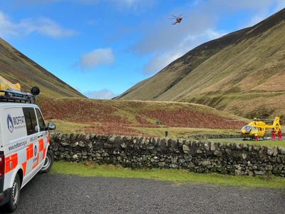 Rescue operation launched after man swept down Scottish waterfall