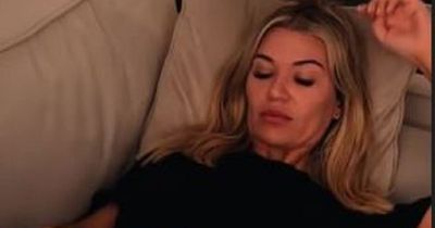 Christine McGuinness floors fans as she raises cropped top to reveal incredible six pack