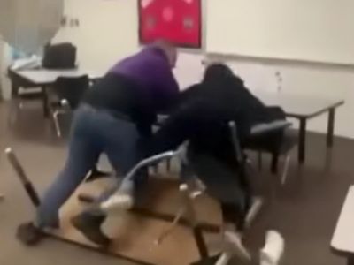 Teacher placed on leave after shocking video shows him slamming student into wall