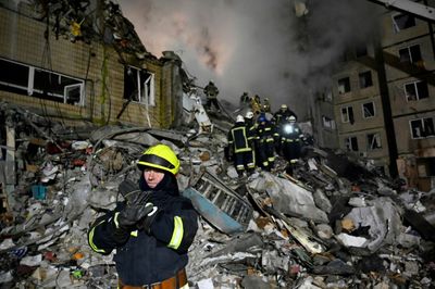 Anxious vigil outside destroyed Dnipro tower block